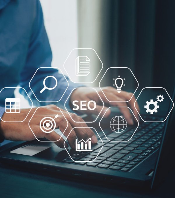 SEO specialist working on laptop to improve website rankings and search engine performance